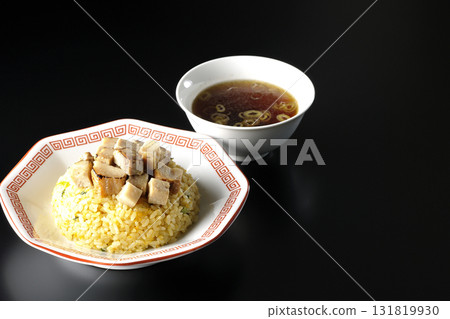 Egg fried rice topped with diced pork and Chinese soup Egg fried rice topped with diced pork and Chinese soup 131819930