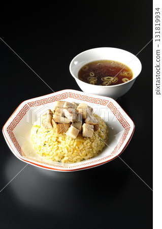 Egg fried rice topped with diced pork and Chinese soup Egg fried rice topped with diced pork and Chinese soup 131819934