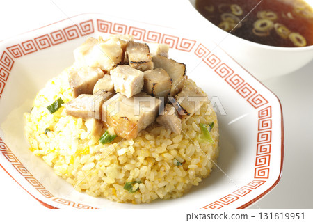 Egg fried rice topped with diced pork and Chinese soup Egg fried rice topped with diced pork and Chinese soup 131819951