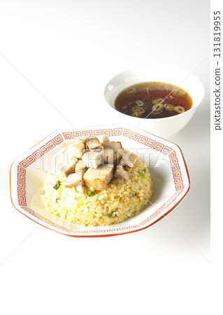 Egg fried rice topped with diced pork and Chinese soup Egg fried rice topped with diced pork and Chinese soup 131819955