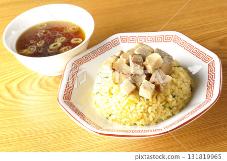 Egg fried rice topped with diced pork and Chinese soup Egg fried rice topped with diced pork and Chinese soup 131819965
