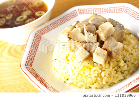 Egg fried rice topped with diced pork and Chinese soup 131819966