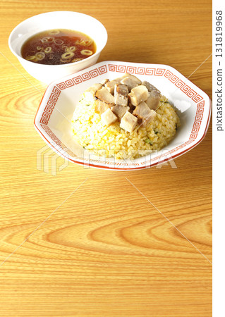 Egg fried rice topped with diced pork and Chinese soup 131819968