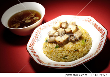 Egg fried rice topped with diced pork and Chinese soup Egg fried rice topped with diced pork and Chinese soup 131819974