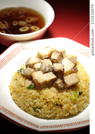 Egg fried rice topped with diced pork and Chinese soup Egg fried rice topped with diced pork and Chinese soup 131819979