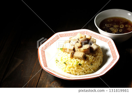 Egg fried rice topped with diced pork and Chinese soup Egg fried rice topped with diced pork and Chinese soup 131819981