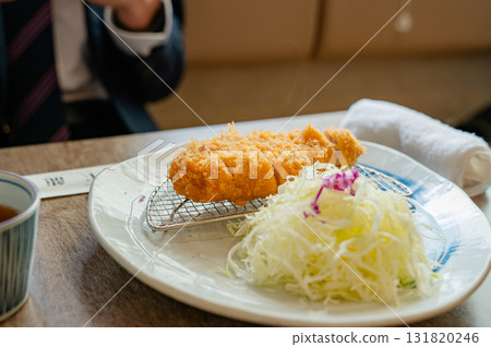 A man eating A man eating 131820246