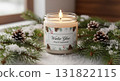 Festive Candle With Pine Branches and Snowflakes on White Blanket for Christmas 131822115
