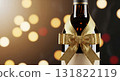 Wine Bottle with Gold Ribbon against Bokeh Lights Festive Celebration 131822119
