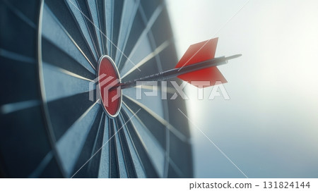 Target practice reveals precision with dart hitting bullseye in a calm indoor environment during daylight hours Target practice reveals precision with dart hitting bullseye in a calm indoor environment during daylight hours 131824144