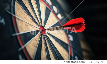 Perfectly aimed dart strikes the bullseye on a traditional dartboard during a casual game night Perfectly aimed dart strikes the bullseye on a traditional dartboard during a casual game night 131825199