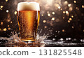Bright, sparkling beer glass splashing against a blurred golden background during a festive gathering 131825548