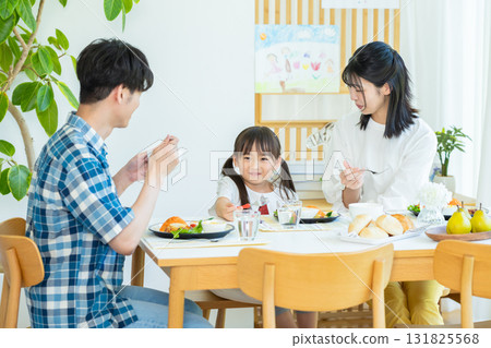 Family to dine at the dining room Family to dine at the dining room 131825568