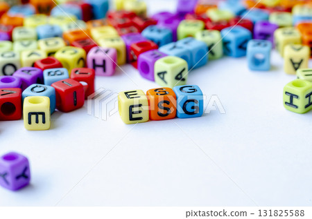 Side view of ESG text on multicolored cube representing Environmental, Social, and Governance. Conservation concept. 131825588