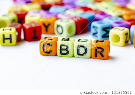 CBDR text on multicolored cubes representing Common But Differentiated Responsibilities. Conservation concept. 131825591