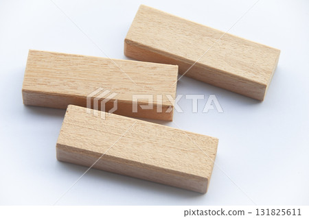 Wooden blocks on white background with customizable space for text. 131825611
