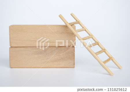 Wooden blocks with wooden ladder with customizable space for text. 131825612