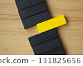 Top view of black and yellow blocks with customizable space for text. 131825656