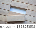 Top view of open piece of wooden blocks on white background with customizable space for text. 131825658