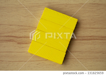 Top view of blank yellow wooden blocks. 131825659