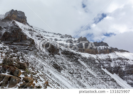 Blue sky, clouds and snowy mountains in Canada 131825907
