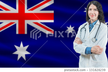 Australian medicine and healthcare concept. Doctor close up against Australia flag background Australian medicine and healthcare concept. Doctor close up against Australia flag background 131828239