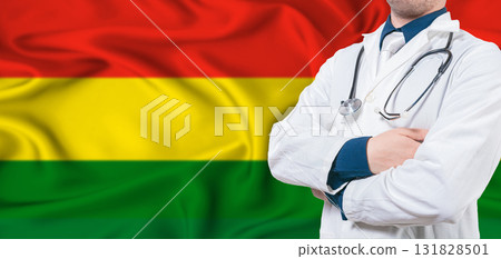 Bolivia healthcare concept. Male doctor on Bolivia flag. Doctor with crossed arms on Bolivia flag Bolivia healthcare concept. Male doctor on Bolivia flag. Doctor with crossed arms on Bolivia flag 131828501