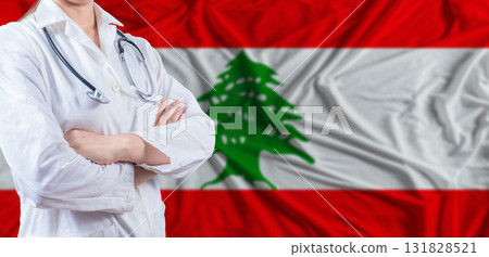 Doctor with crossed arms on Lebanon flag. Lebanese health and care concept. Female doctor on Lebanon flag 131828521