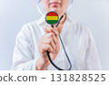 Female doctor holding stethoscope with Bolivia flag. National health system of Bolivia 131828525