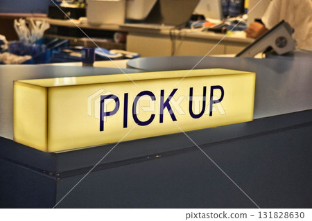 Close up Pick Up Sign on a Counter. 131828630