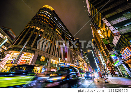 Tokyo cityscape, Japan, October 10th. View of Nihonbashi Mitsukoshi department store in front of Mitsukoshimae Station and the intersection at the north end of Nihonbashi. Tokyo cityscape, Japan, October 10th. View of Nihonbashi Mitsukoshi department store in front of Mitsukoshimae Station and the intersection at the north end of Nihonbashi. 131829455
