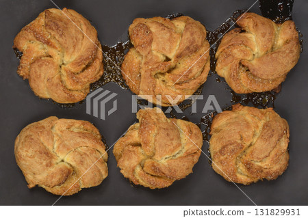 Freshly Baked Cardamom Rolls Freshly Baked Cardamom Rolls 131829931
