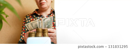 banner image symbolizing business success and wealth. A professional woman's hands are shown actively counting stacks of dollar money, cash, emphasizing financial growth and success banner image symbolizing business success and wealth. A professional woman's hands are shown actively counting stacks of dollar money, cash, emphasizing financial growth and success 131831295
