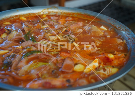 Korean Army Stew (Budae Jjigae) Boiling in a Large Pot Korean Army Stew (Budae Jjigae) Boiling in a Large Pot 131831526