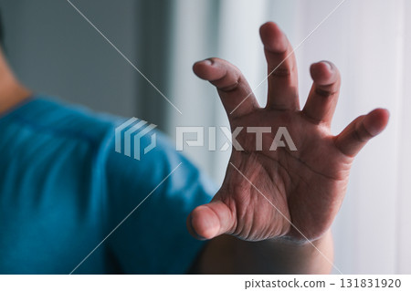 Dynamic hand gesture indoor setting human interaction close-up view expressive concept 131831920