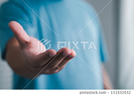 Hand reaching for connection indoor space gesture modern environment close-up human interaction 131832032