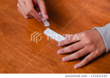 Home testing procedure health care setting medical test indoor close-up view self-assessment for health 131832283