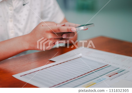 Engaging business insights from mobile devices office setting digital content interactive environment close-up view Engaging business insights from mobile devices office setting digital content interactive environment close-up view 131832305