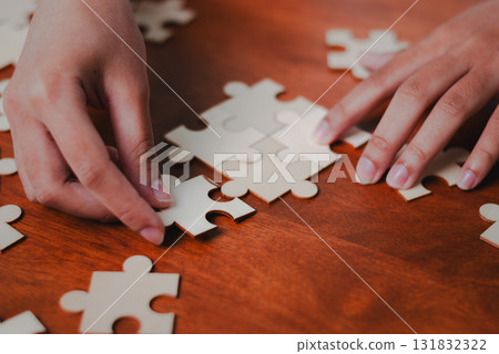 Puzzle solving business strategy workshop office space interactive learning environment engaging perspective Puzzle solving business strategy workshop office space interactive learning environment engaging perspective 131832322