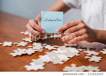 Collaboration workshop office space team building activity indoor setting close-up view engaging concept Collaboration workshop office space team building activity indoor setting close-up view engaging concept 131832435