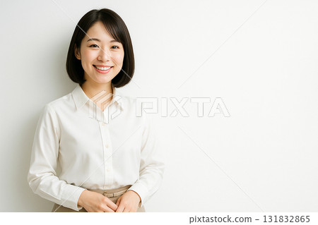 Smiling woman in office casual wear 131832865