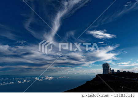 An observatory on a southern island floating in a sea of clouds An observatory on a southern island floating in a sea of clouds 131833113