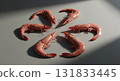 Shrimps Arranged in Circular Pattern on Gray Surface 131833445