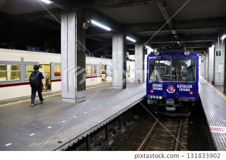 A Toyama Chiho Railway train stops at the platform at Tateyama Station A Toyama Chiho Railway train stops at the platform at Tateyama Station 131833902