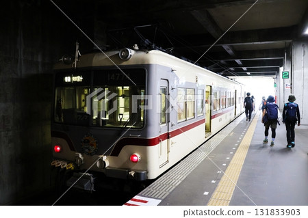 A Toyama Chiho Railway train stops at the platform at Tateyama Station A Toyama Chiho Railway train stops at the platform at Tateyama Station 131833903