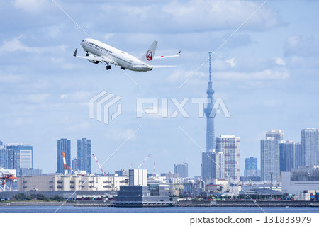Scenery of Haneda Airport, plane taking off and Tokyo Skytree, Ota Ward, Tokyo 131833979