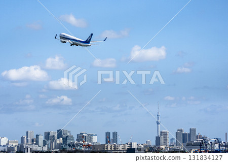 Scenery of Haneda Airport, plane taking off and Tokyo Skytree, Ota Ward, Tokyo 131834127
