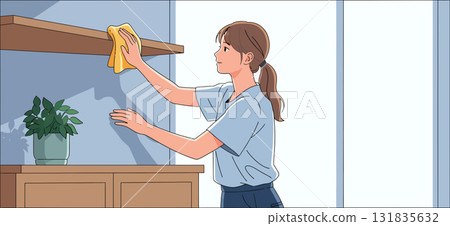 Young woman dusting furniture at home 131835632