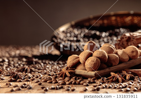Chocolate truffles with cinnamon, anise, and coffee beans. Chocolate truffles with cinnamon, anise, and coffee beans. 131835911
