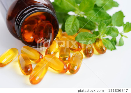 Alternative medicine herbal organic capsule with vitamin E omega 3 fish oil, mineral, drug with herbs leaf natural supplements for healthy good life. 131836847